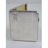 A HM silver octagonal cigarette case having engine turned engraved pattern throughout,