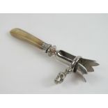 A late 19th / early 20th century French silver plate and horn manche a gigot (ham bone holder) with