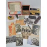 A quantity of vintage spectacles, together with a vintage writing set, a boxed set of weights,
