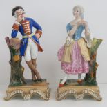 A pair of late 19th/early 20th century Continental figural spill vases, no makers marks,