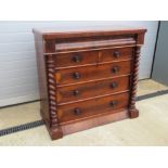 A 19th century Scottish chest of drawers having 'secret' top drawer,