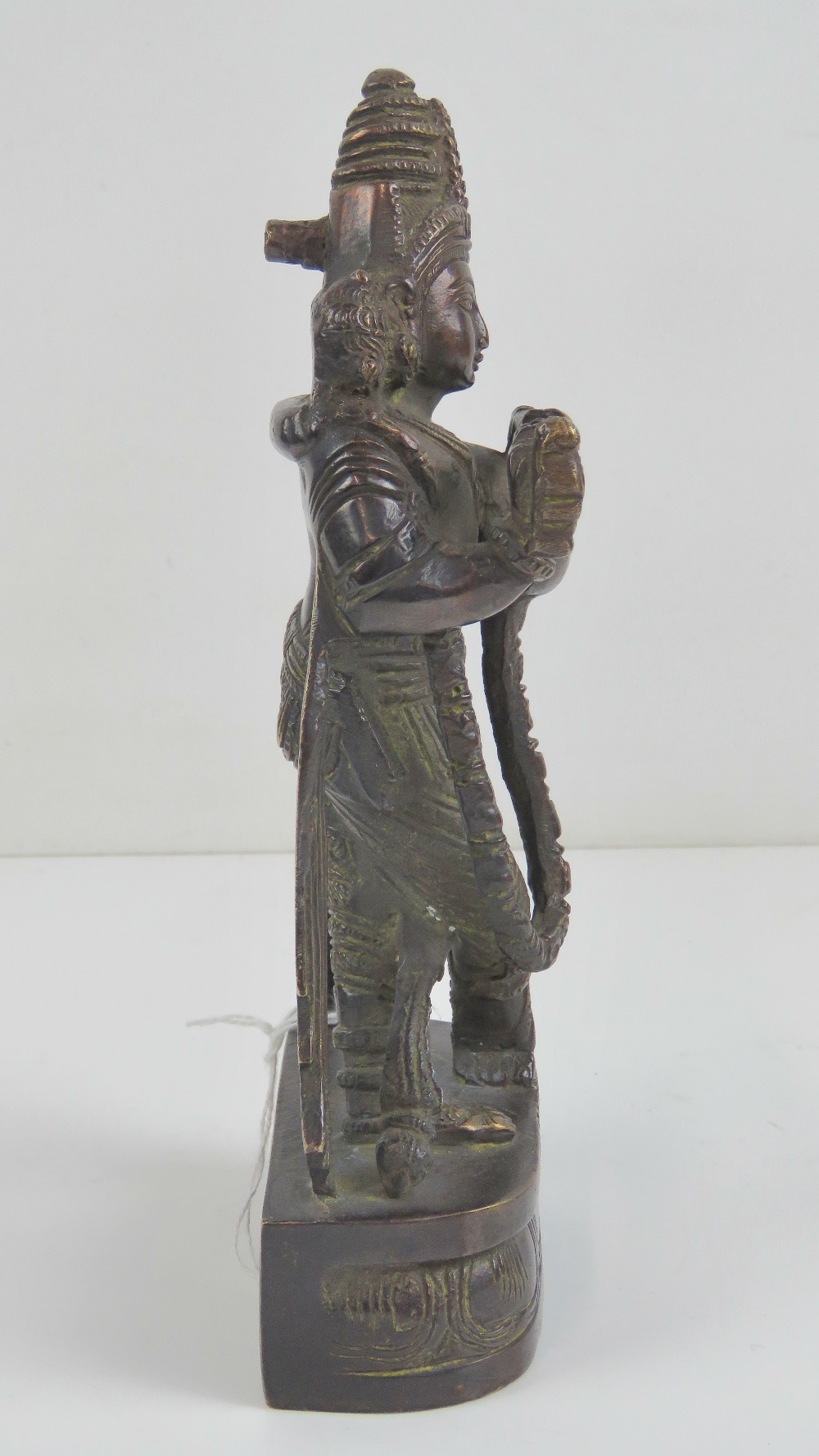 A 19th century cast brass Indo-Asian deity standing 21cm high. - Image 2 of 4