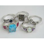 Five costume jewellery rings including a haematite signet style ring by Sarah Coventry.