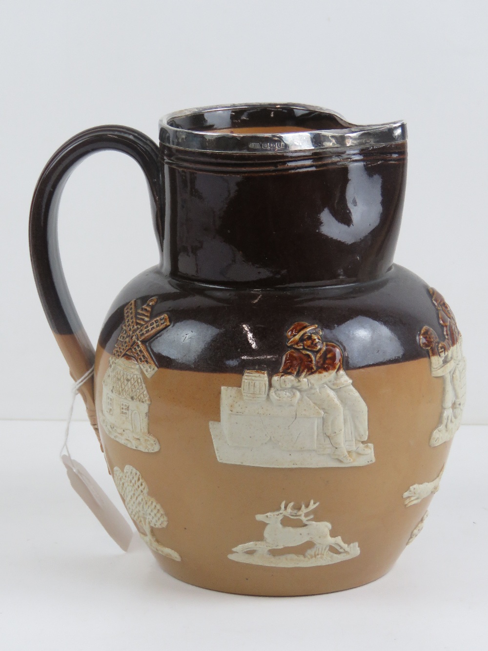 A Doulton harvest jug with silver rim hallmarked Sheffield 1903, 19cm high. - Image 2 of 4