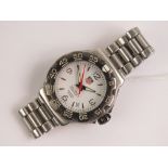 A Tag Heuer Formula 1 stainless steel wristwatch with original strap, white dial, date aperture,