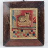A 19th century framed needlepoint of a seated cat, rosewood frame, 18 x 16cm.