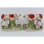 Staffordshire flatbacks; cows and milk maids an opposing pair, 16cm high, a/f.