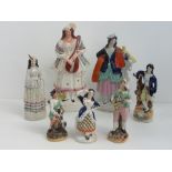 Staffordshire flatbacks; seven assorted figurines ranging in size 19 -35cm, a/f.