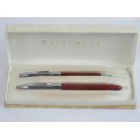 A vintage Waterman fountain pen and retractable pencil set in box,