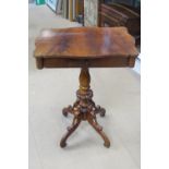 A Victorian walnut half veneered shaped side table having frieze drawer,
