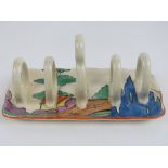 A Clarice Cliff bizarre five sectional toast rack, 17cm wide.