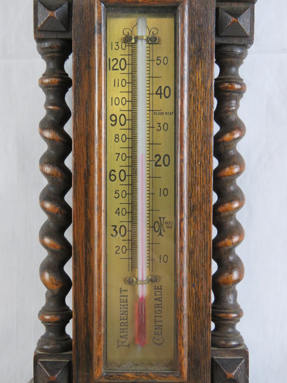 A compensated circular aneroid barometer in mahogany frame, 22cm dia, - Image 3 of 4