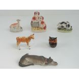 A single Beswick calf, together with a miniature Staffordshire Spaniel pair, Staffordshire rabbit,