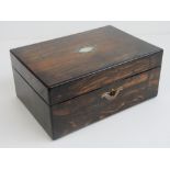 A Victorian rosewood box inlaid with mother of pearl, lid lifting to reveal compartment within,