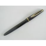 A vintage Waterman 'self-filler' fountain pen with original 14ct gold nib.