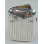 A HM silver cigarette case having engine turned engraved decoration to front and back,