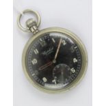 A British military pocket watch marked with the broad arrow and G.S.T.