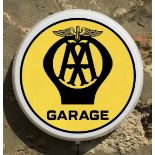 A contemporary illuminated 'old style' AA garage circular wall sign measuring 43cm diameter.