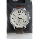 A Hugo Boss stainless steel wristwatch in as new condition complete with box and papers,