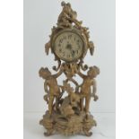 A Continental gilt spelter figural clock with later quartz movement.