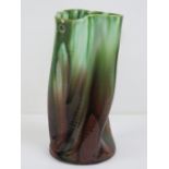 A Linthorpe twisted dresser vase standing 18cm high.