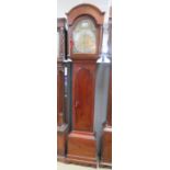 A London made eight day striking long case clock having arch top 11" dial with Arabic and Roman