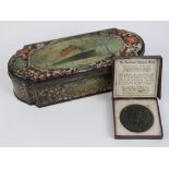 A rare RMS Lusitania Huntley & Palmers biscuit tin dated 1908 made to celebrate the regaining of