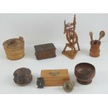 A quantity of treen including lidded boxes, lidded butter dish,