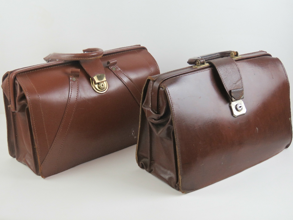 Two 20th century pigskin leather Gladstone bags.