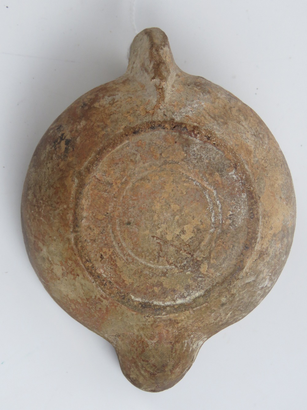 An antique stoneware oil lamp in the Egyptian style, 11cm deep. - Image 4 of 4