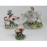 Three single Staffordshire cow figurines, 19 - 8cm, a/f.