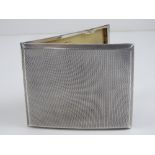 A HM silver cigarette case having engine turned pattern throughout,