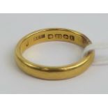 A 22ct gold d-band ring, hallmarked Birmingham, repaired cut, size J, 4.1g.