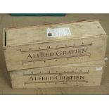 A pair of contemporary wooden champagne boxes.