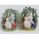 Staffordshire flatbacks; lovers in mossy alcove, each 24cm high, a/f. Two items.