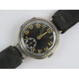 A HM silver military 'trench' style wristwatch having black dial with luminous hands and subsidiary