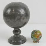 A Chinese pewter tea caddy or tobacco jar in the form of a table top terrestrial globe,