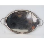 A large and impressive HM silver oval tray having twin end handles,