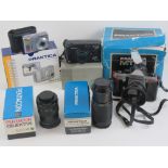 A Practika ML5 35mm SLR camera in box, together with a Practika 8-200mm zoom lens,