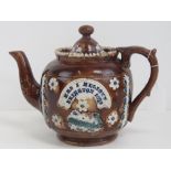 A 19th century barge ware teapot with presentation embellishment I Elliot Brinkton 1878.