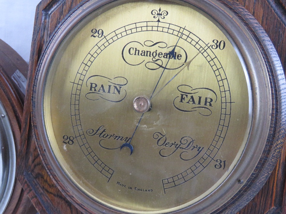 A compensated circular aneroid barometer in mahogany frame, 22cm dia, - Image 2 of 4