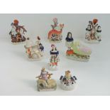 Staffordshire; eight assorted figurines ranging in size 17 - 8cm, a/f.