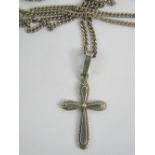 A 925 silver cross having patterned border and complete with silver chain, chain length 56cm.