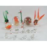 A quantity of glass ornaments including stylised animals, paperweights,