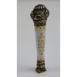 A French silver gilt and gilded porcelain seal measuring 8cm in length.