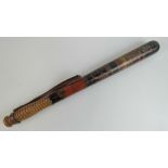 A Victorian truncheon having black ground with painted crown and VR cypher, 'Police' marked upon,