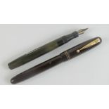 A vintage Swan Mable Todd 'self-filler' fountain pen with original 14ct gold nib.