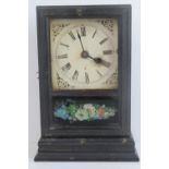 A 19th century table clock having tin plate dial with Roman numerals, later quartz movement.