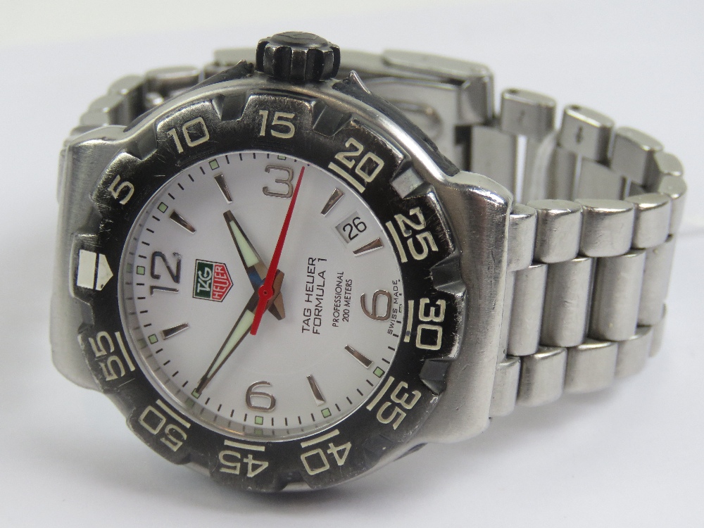 A Tag Heuer Formula 1 stainless steel wristwatch with original strap, white dial, date aperture, - Image 2 of 5