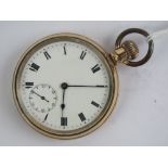 A Waltham open face gold plated pocket watch having Dennison star case,